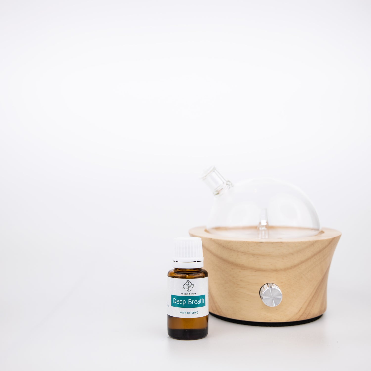 Essential oil diffuser: glass and wood